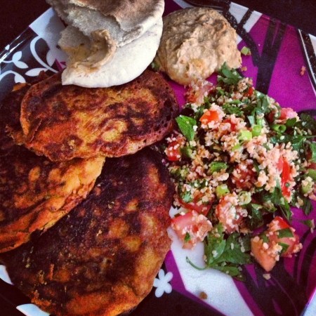 Snack plate with leek fritters, tabbouleh, & hummus